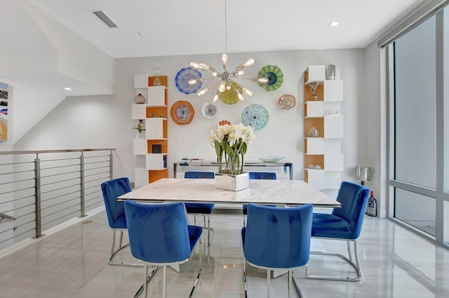 dining room featuring a chandelier