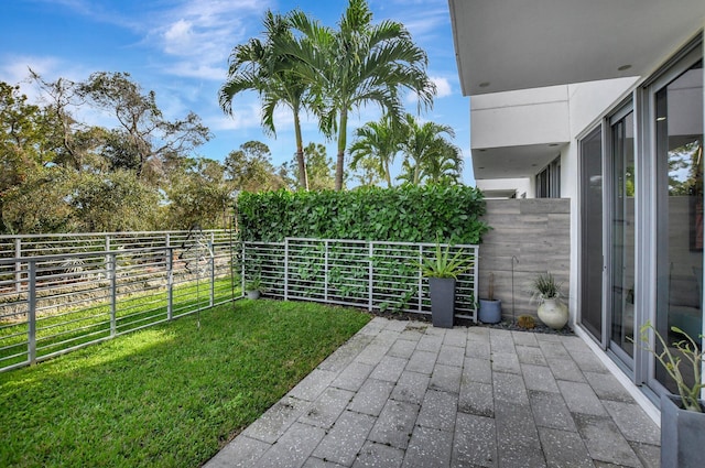 view of yard featuring a balcony