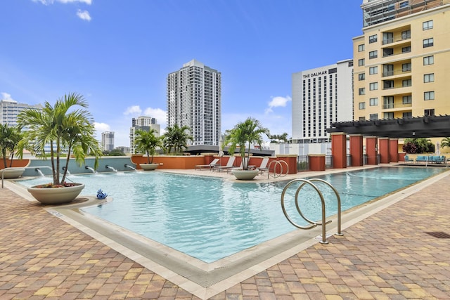 view of swimming pool featuring a patio area