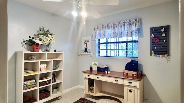 tiled office featuring ceiling fan