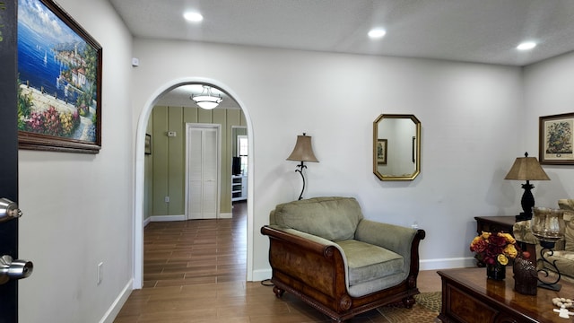 sitting room featuring hardwood / wood-style floors