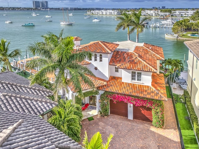 birds eye view of property featuring a water view