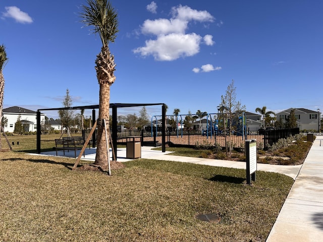 view of jungle gym with a lawn