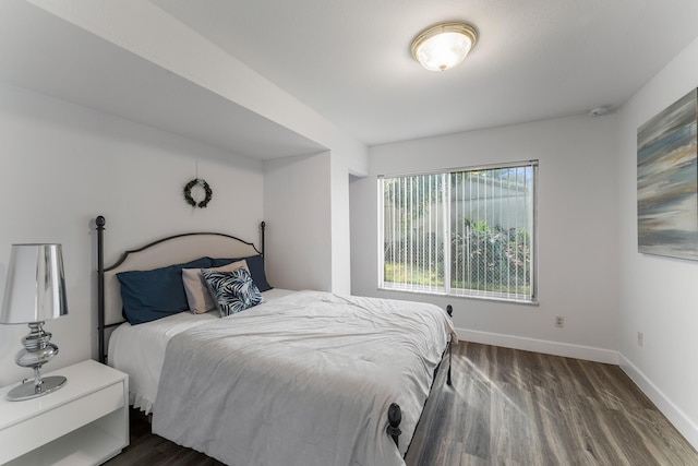 bedroom featuring dark hardwood / wood-style floors