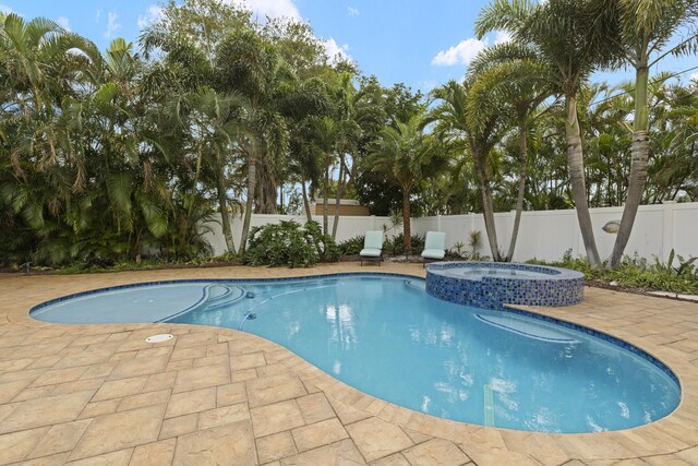 view of patio / terrace featuring ceiling fan and grilling area