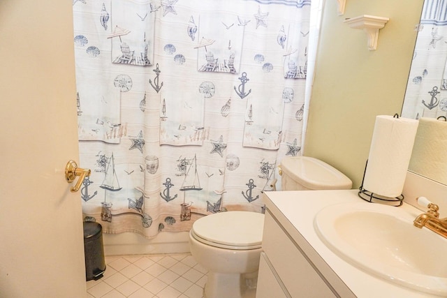 full bathroom with shower / tub combo with curtain, tile patterned floors, toilet, and vanity