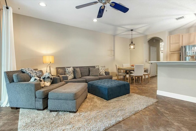 living room featuring ceiling fan