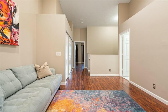 living room with dark wood-type flooring