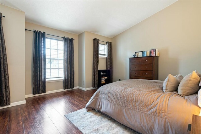 bedroom featuring dark hardwood / wood-style flooring