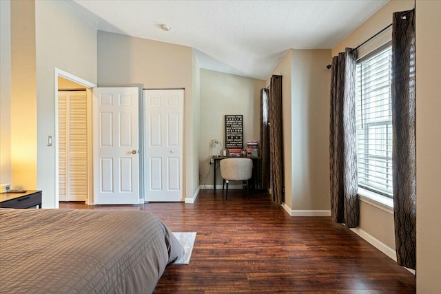 bedroom featuring dark wood-type flooring