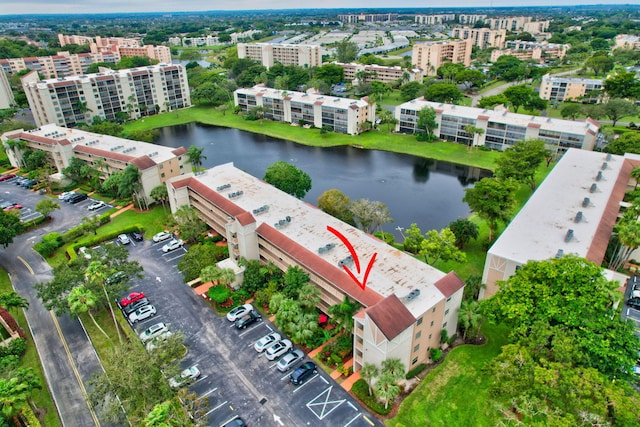 bird's eye view with a water view