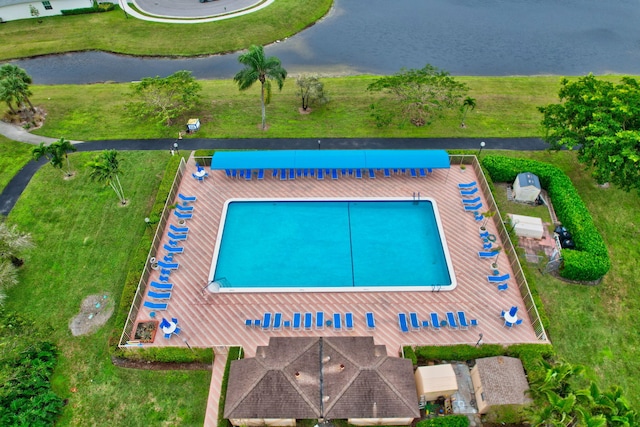 view of pool with a water view