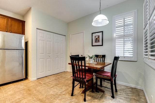 dining room featuring light tile patterned floors