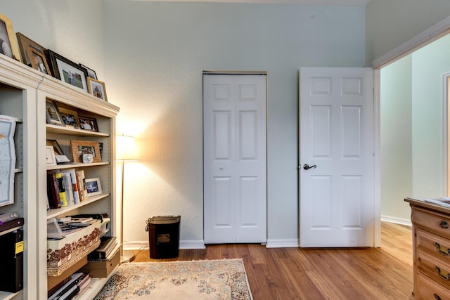 interior space with hardwood / wood-style floors