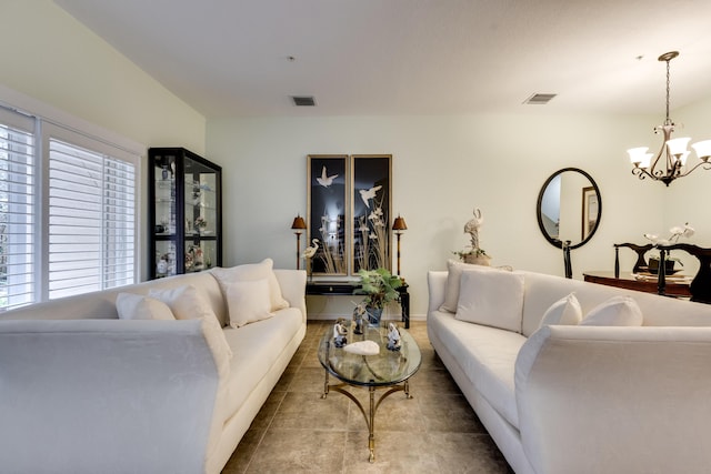 living room featuring a notable chandelier