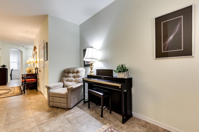 living area featuring light tile patterned flooring