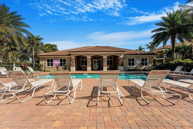 view of pool featuring a patio