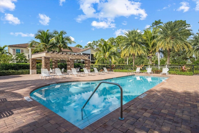 view of pool featuring a patio and a pergola