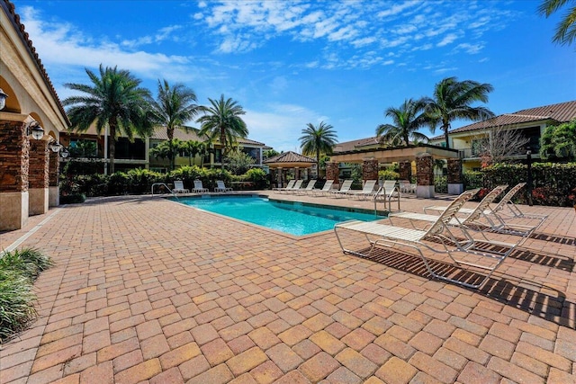 view of pool featuring a gazebo and a patio