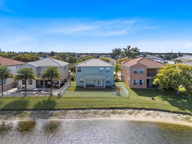 view of front of home with a garage and a front yard