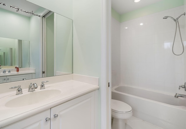 full bathroom with shower / washtub combination, toilet, tile patterned flooring, and vanity