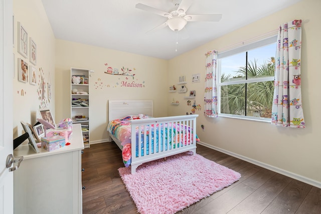 bedroom featuring dark wood-type flooring and ceiling fan