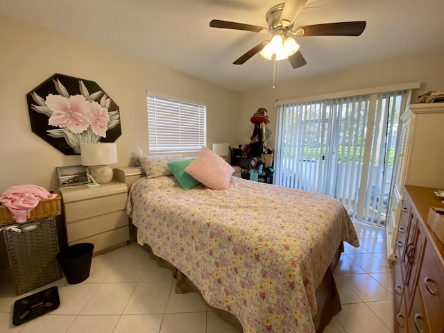 tiled bedroom featuring access to outside and ceiling fan