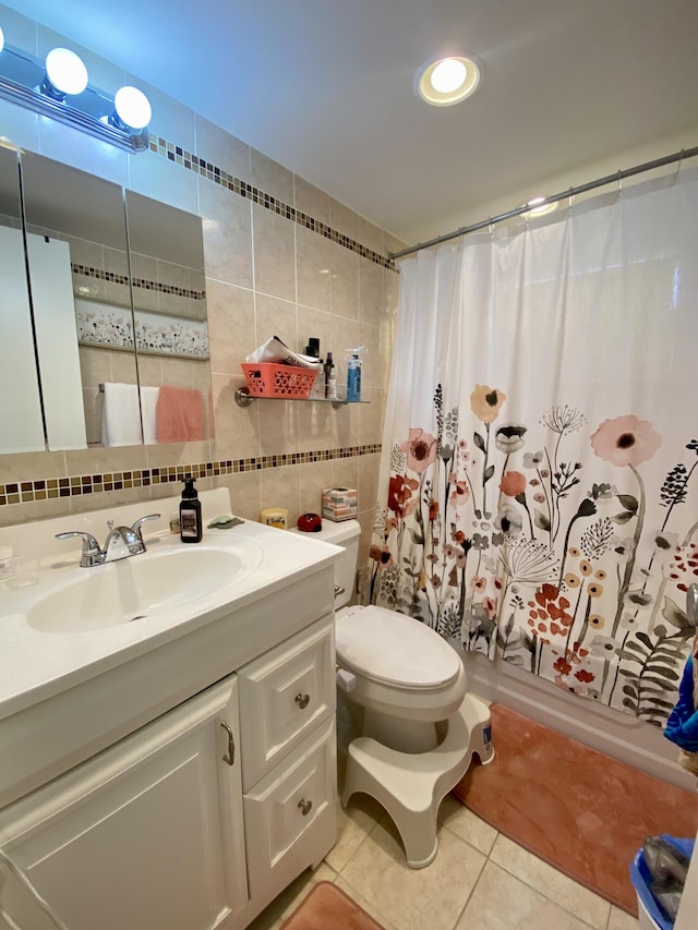 full bathroom featuring tile walls, tasteful backsplash, tile patterned floors, toilet, and shower / bath combo with shower curtain