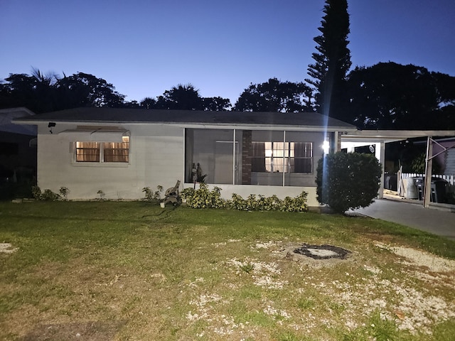 1105 Sunrise Blvd, Fort Pierce, FL 34950 - view of front of house with a front yard