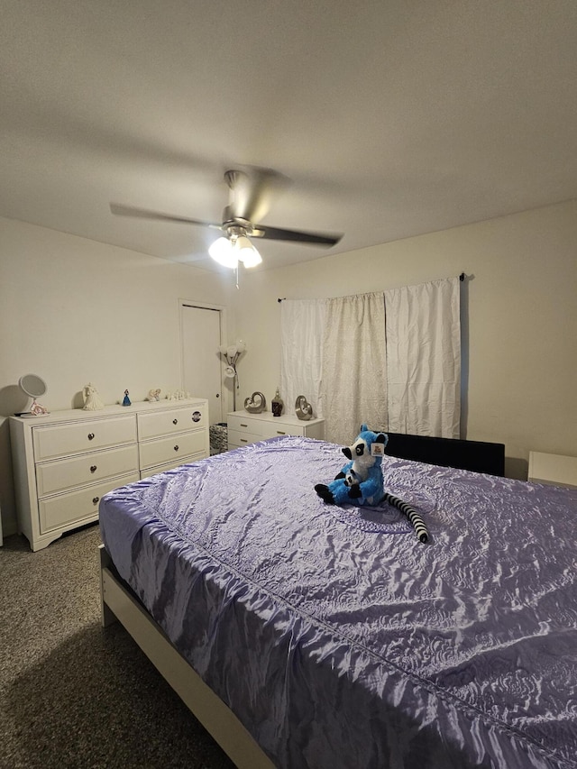 1105 Sunrise Blvd, Fort Pierce, FL 34950 - bedroom featuring dark colored carpet and a ceiling fan