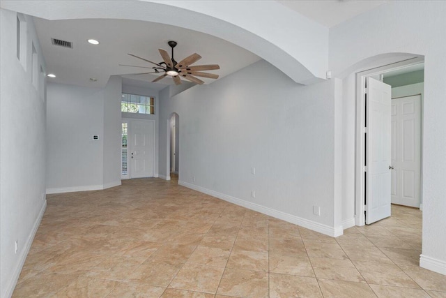 empty room featuring ceiling fan