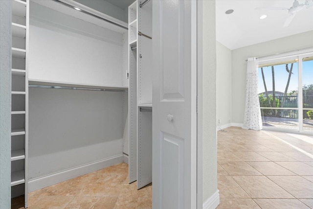 walk in closet featuring light tile patterned floors