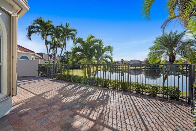 view of patio / terrace featuring a water view