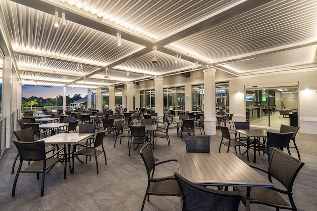 view of patio terrace at dusk