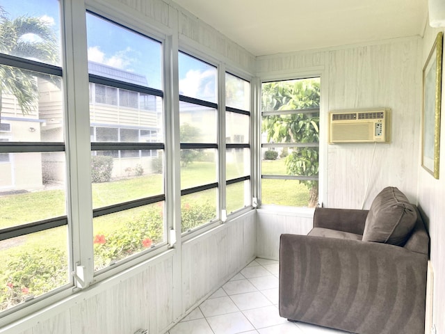 sunroom / solarium with a wall mounted AC