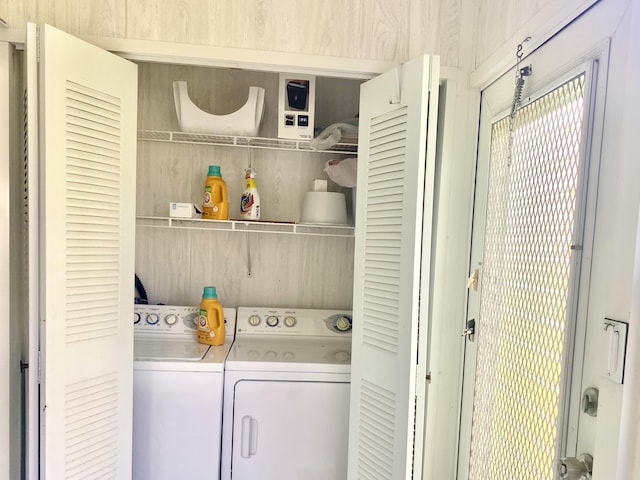 laundry room featuring washing machine and dryer