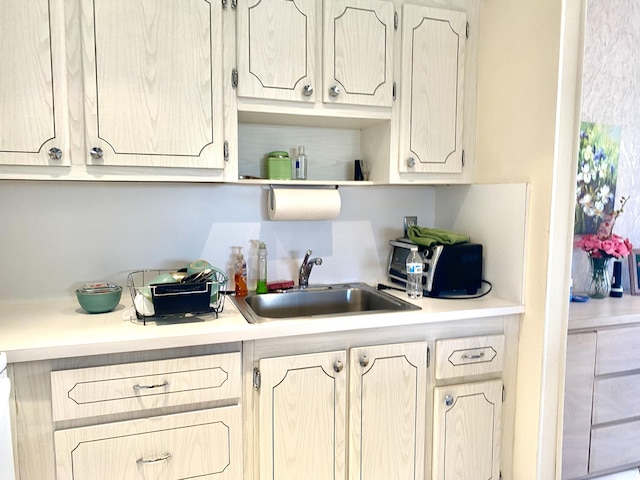 kitchen featuring sink and light brown cabinets