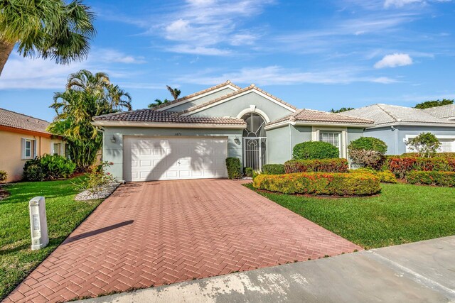 view of exterior entry with a garage