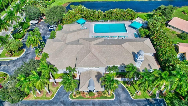 birds eye view of property featuring a water view