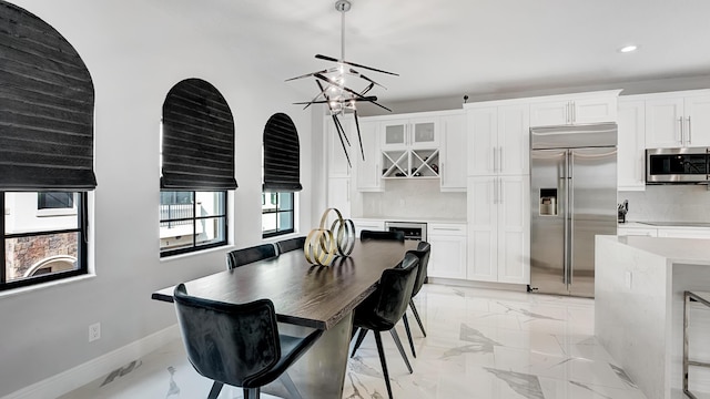 dining room featuring a chandelier