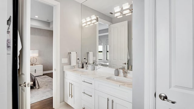 bathroom featuring vanity and hardwood / wood-style floors