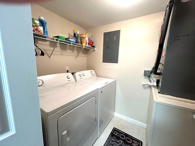 washroom featuring electric panel and washing machine and dryer