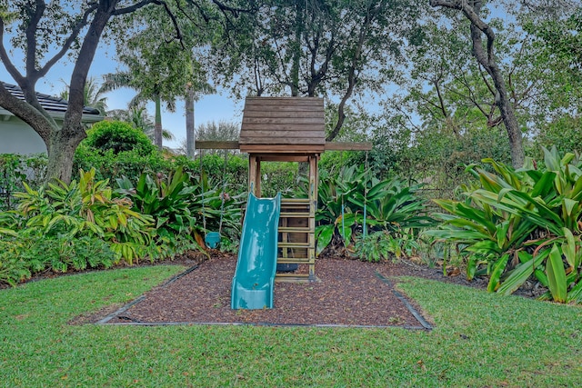 view of jungle gym featuring a yard