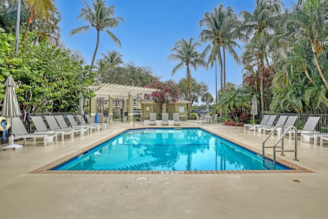 view of swimming pool with a pergola and a patio area