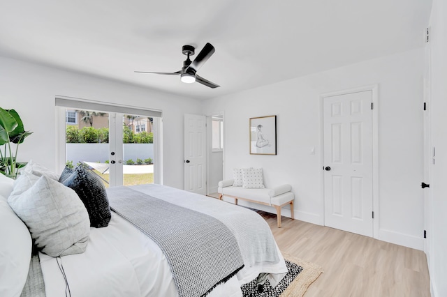 bedroom with french doors, access to exterior, ceiling fan, and light hardwood / wood-style floors