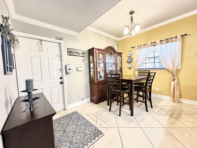 tiled dining space featuring crown molding and a notable chandelier