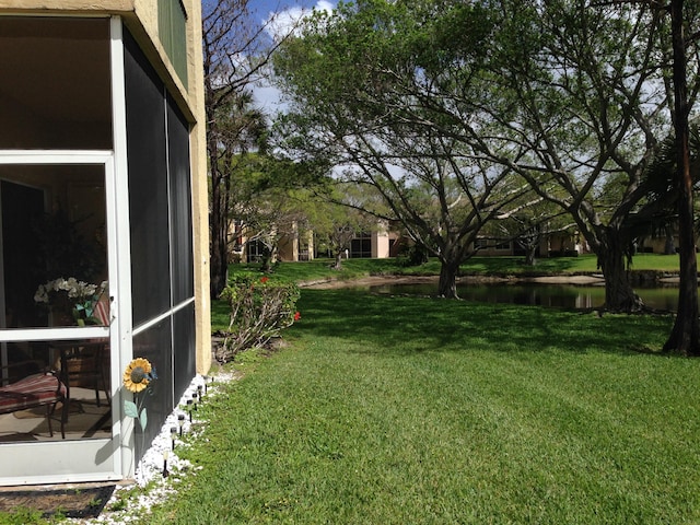 view of yard with a water view