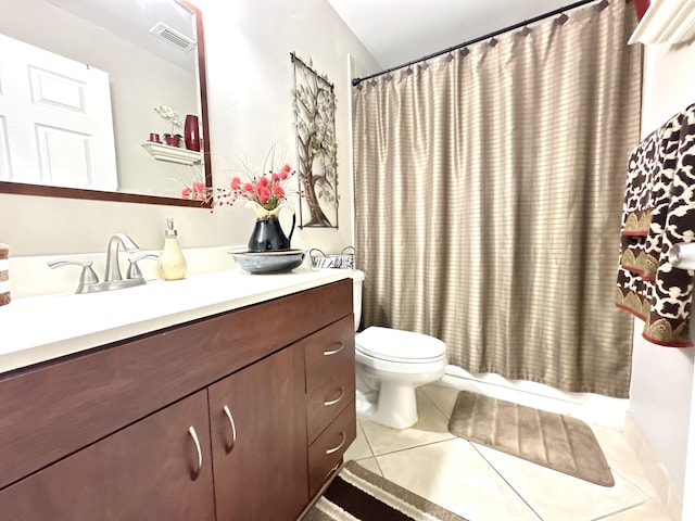 full bathroom with vanity, toilet, tile patterned flooring, and shower / bath combo with shower curtain