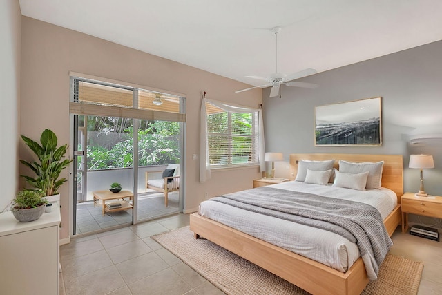 tiled bedroom with access to exterior and ceiling fan