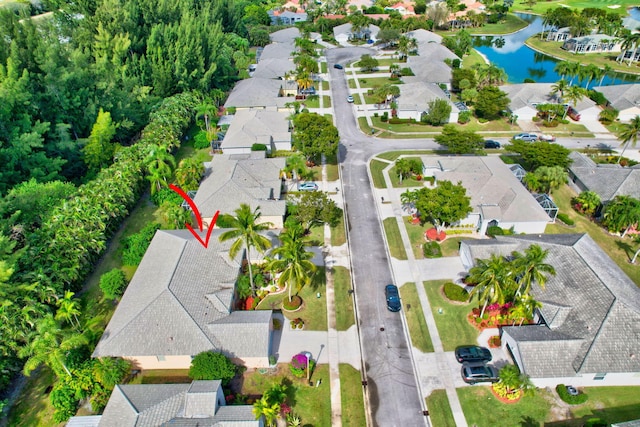 drone / aerial view featuring a water view